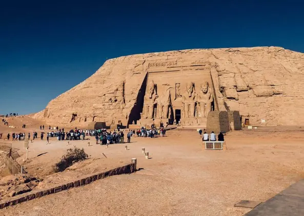 Visitors at the magnificent Abu Simbel Temple in Aswan, Egypt
